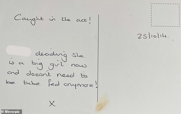 On the back she wrote: 'Caught red-handed!  (Baby's name) decides she's a big girl now and doesn't need tube feeding anymore!  X'