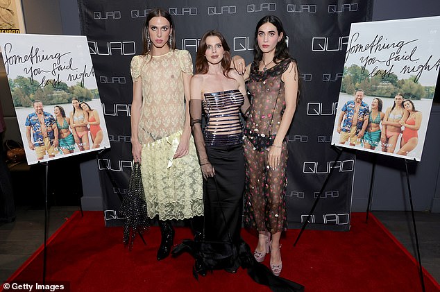 Posing with the filmmakers: After posing on the red carpet, she also posed with actress Carmen Madonia and the film's writer and director, Luis De Filippis, in addition to the movie posters.