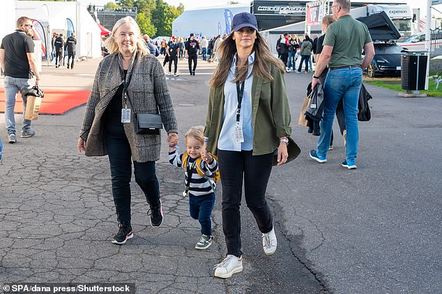 Princess Sofia looked relaxed as she walked around the grounds of the Mantorp Park Motorsport Circuit with her young family - who were clearly excited to be there