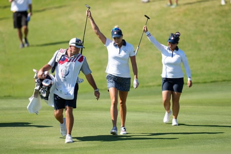 Lexi Thompson, centre, and Megan Khang on their way to victory.