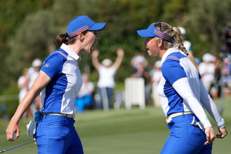 Europe’s Carlota Ciganda, left, and playing partner Emily Pedersen celebrate on the 17th green after defeating Lilia Vu and Jennifer Kupcho.