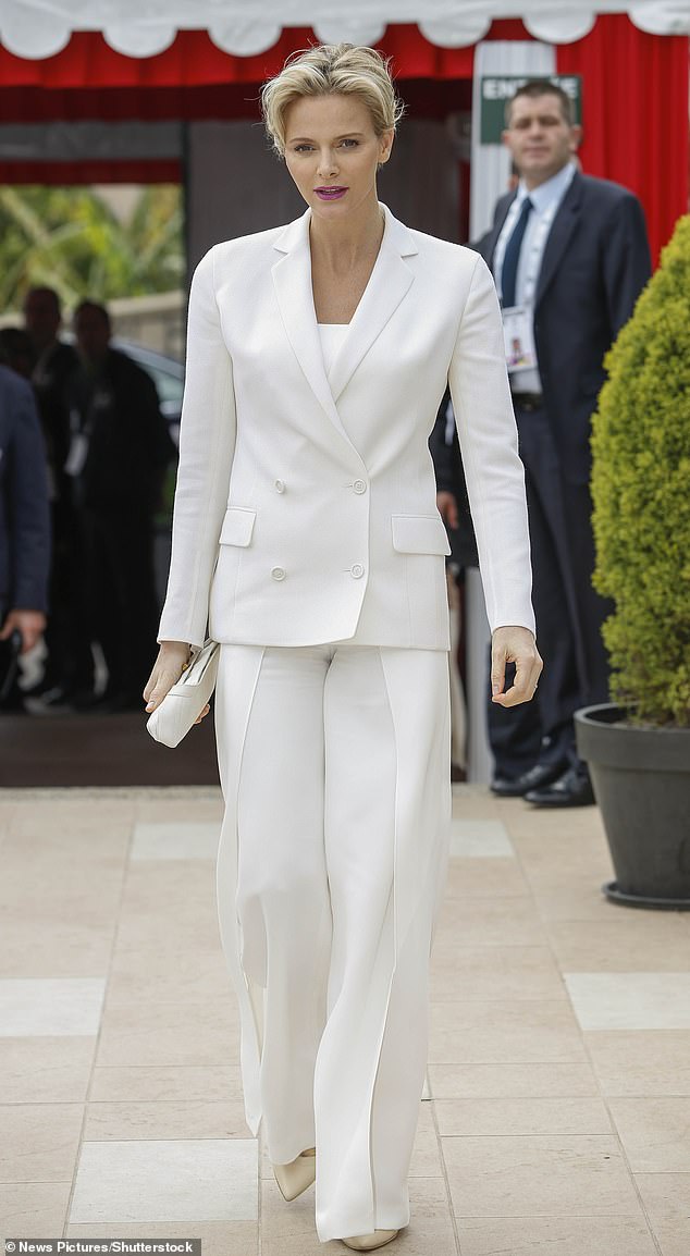 Charlene wears white as she arrives at the Monte Carlo tennis court in 2014