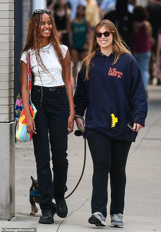 Malia looked trendy as she stepped out with a friend in New York City on September 13 in a white crop top and jeans