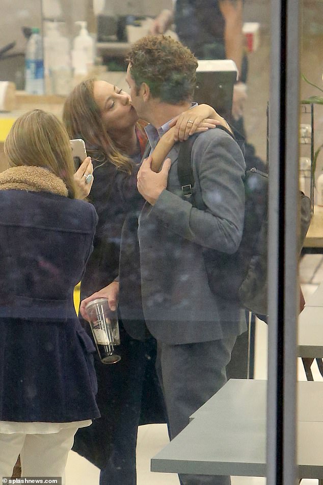 The blow comes despite Phillips standing by her husband's side during his two rape trials.  Bijou is seen kissing Masterson during a lunch break during the trial