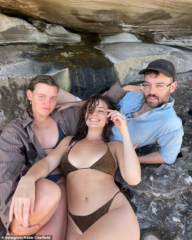 'To celebrate leaving hospital and showering for the first time in four days, I'm looking good with friends on the beach two weeks ago!'  she wrote