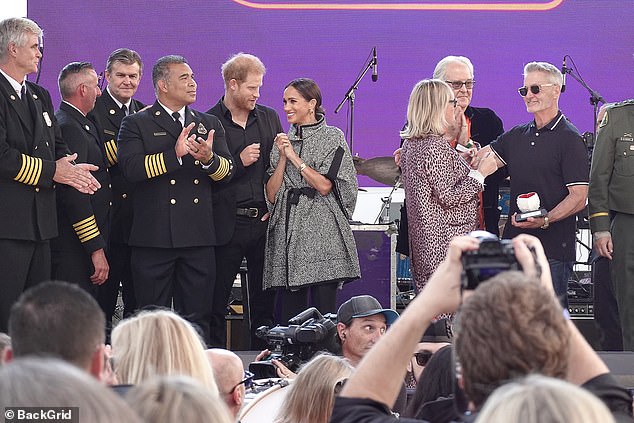 Meghan completed her look with custom black pants and kept her makeup to a minimum for the star-studded fundraiser