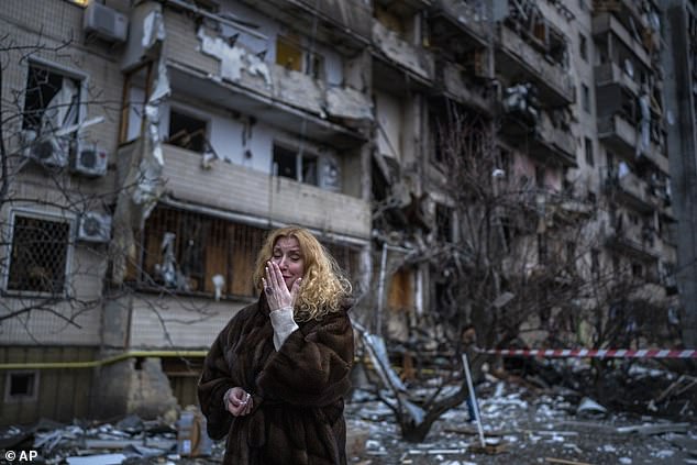 The top diplomat did not comment on the ongoing war.  Pictured: Natali Sevriukova reacts next to her house after a rocket attack on the city of Kiev in February 2022