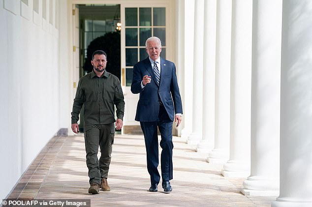 Ukrainian President Volodymyr Zelenskiy walks through the White House colonnade to the Oval Office with US President Joe Biden this week during a visit to the White House