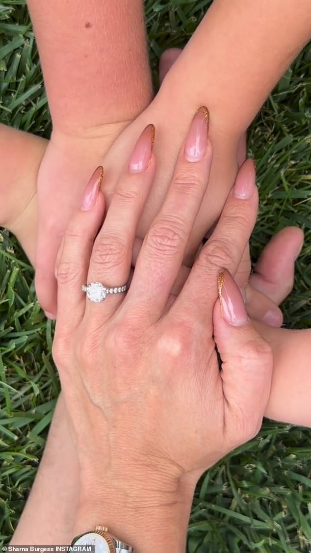 Family affair: The Australian-born dancer finally announced their engagement two months after proposing with an adorable Instagram video involving all five of their children