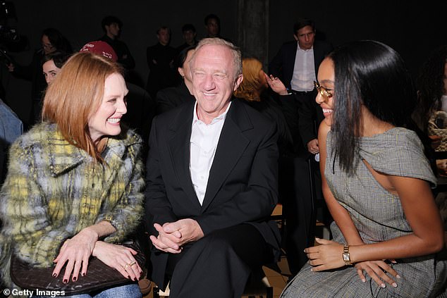 Smiling: Julianne was pictured with French businessman François-Henri Pinault and American actress Yara Shahidi