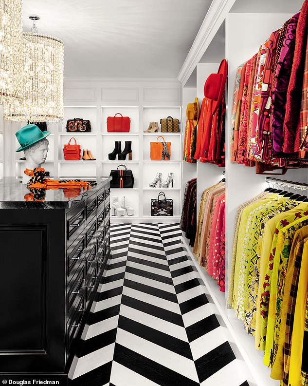 The walk-in closet, created by merging two bedrooms, is filled with vibrant designer clothes, shoes and bags, many of which were custom made for RuPaul