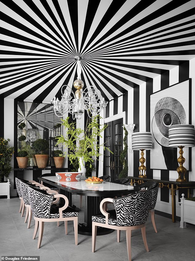 In the dining pavilion, circus-style stripes create a dramatic yet intimate atmosphere, ideal for dinner parties.  The decor is inspired by the card room in the Elizabeth Taylor film Boom