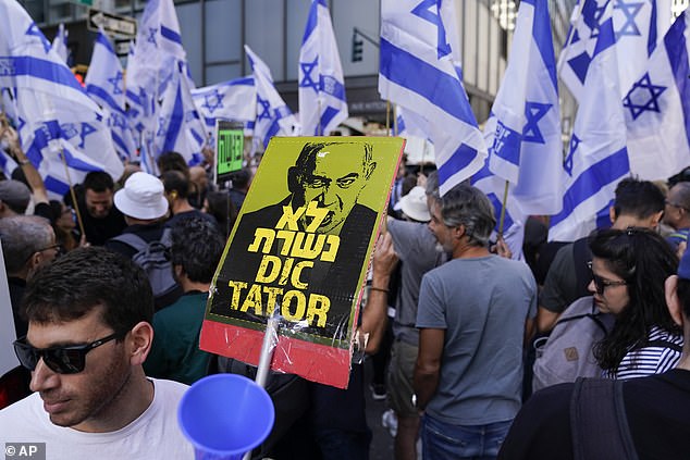 A sign with Israeli Prime Minister Benjamin Netanyahu's face saying 