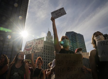 Protesters gather at the Ohio Statehouse and march downtown in support of abortion after the Supreme Court overturned Roe v Wade on June 24, 2022.