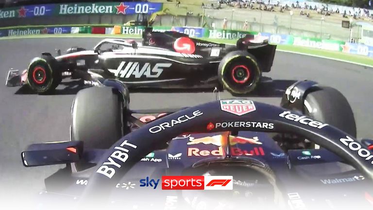 Sergio Perez tries to pass Kevin Magnussen, but gets stuck and sends him to Suzuka