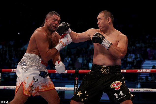 Zhang (right) gave Joyce (left) a devastating knockout in the third round