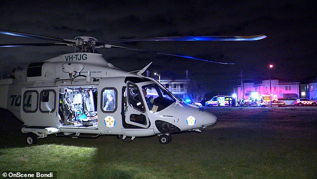 Paramedics, police and a rescue helicopter (pictured) arrived on the scene after 000 was called