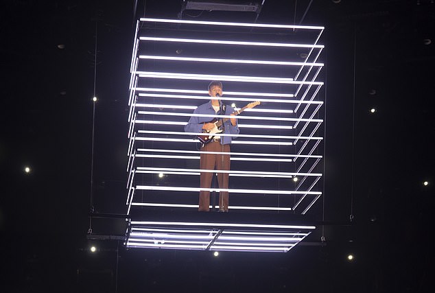 Charlie played a stripped down version of A-ha's Take On Me.  He took the semi-final to new heights by performing in a free box suspended five meters above the stage.  Pictured