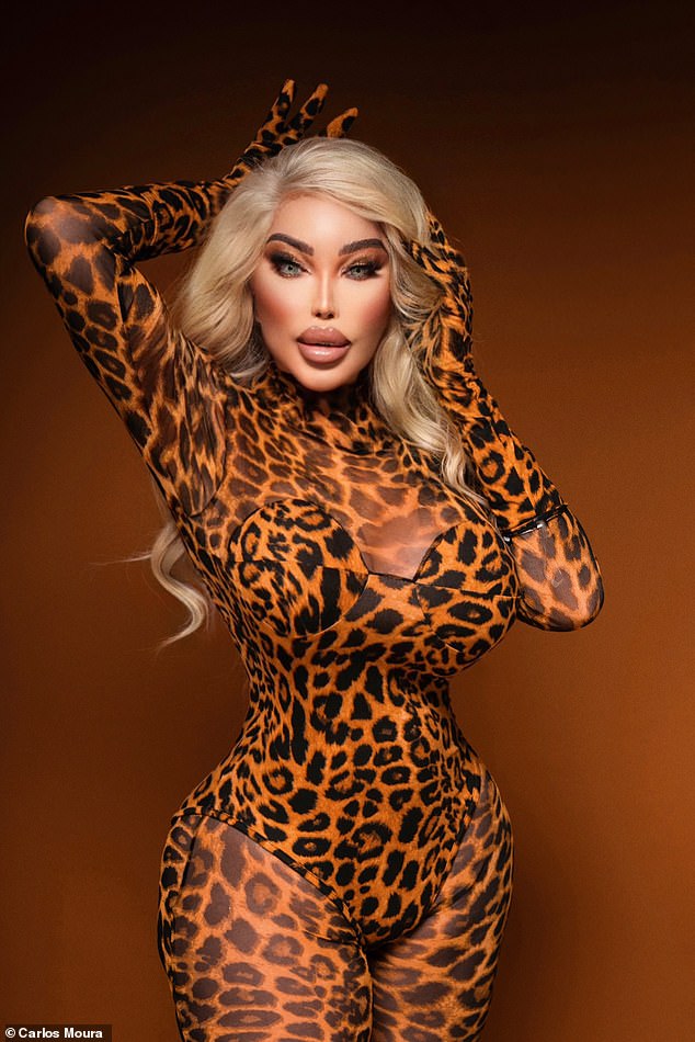 Meow!  The Brazilian-British model, 40, wore a racy, sheer leopard print catsuit for the shoot, which clung to her curvy figure