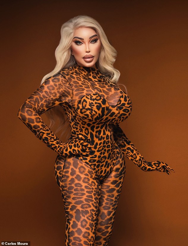 Racy: The sassy catsuit, which showed off her stunning silhouette, featured a high neckline, a corset-style bustier and long, subtly gloved sleeves