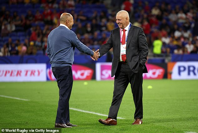 Eddie Jones (left) was booed as he appeared on the big screen after reported talks with Japan.  Meanwhile, Warren Gatland (right) was cheered