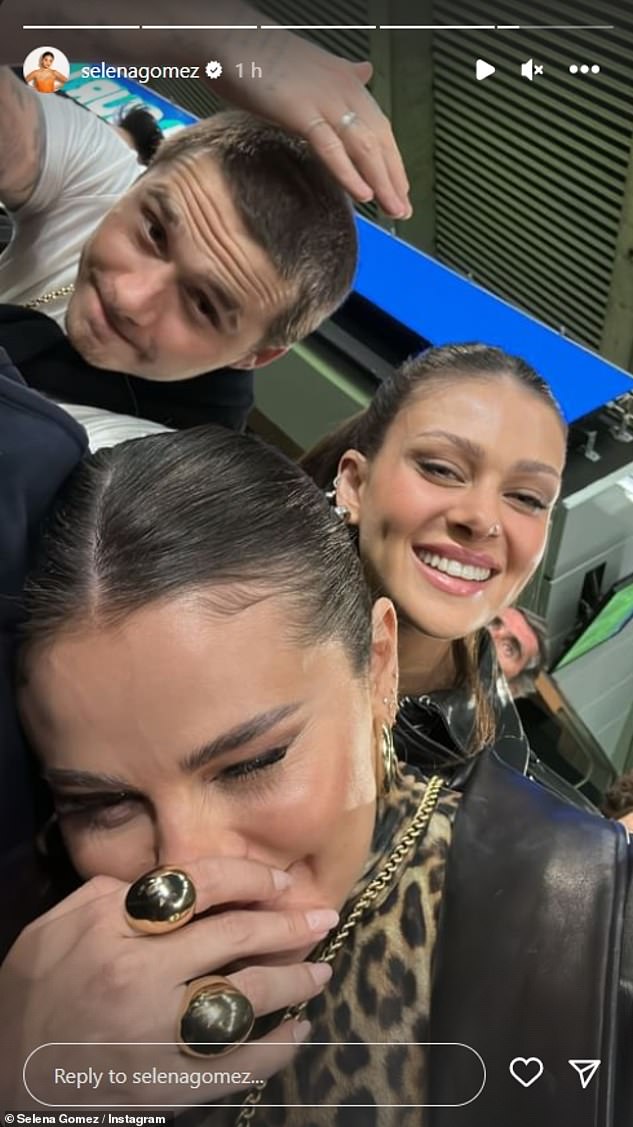 Having fun!  Taking to her Instagram Story, Selena showed off her close friendship with the couple as she shared a sweet selfie of the trio at the stadium