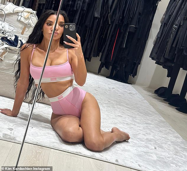 Single and ready to mingle: Although she hasn't told her Instagram followers about a new man yet, Kim does show off her curves in the pink Skims underwear set