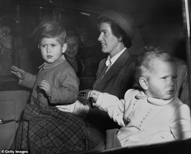 Helen Lightbody with Charles, left, Princess Anne on their way to Buckingham Palace in 1951