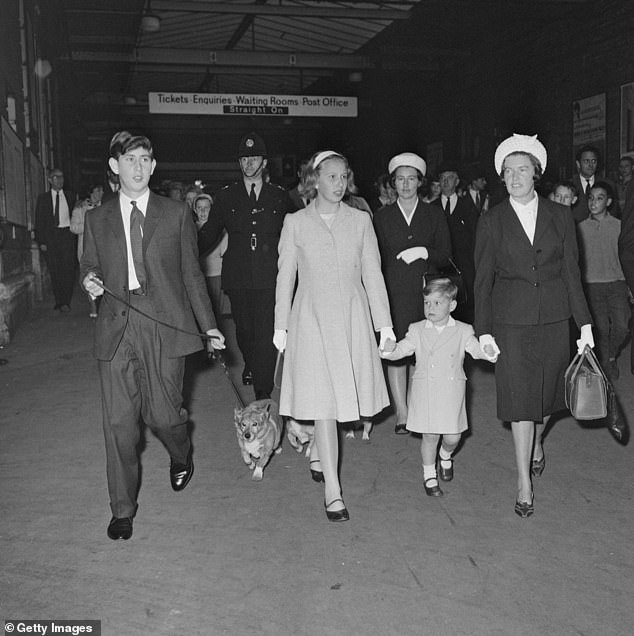 Prince Charles and Princess Anne with their nanny Mabel Anderson at Euston Station, August 1963