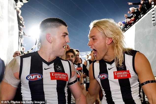 An emotional Maynard with teammate Darcy Moore after their thrilling one-point win over GWS to secure their place in the AFL grand final