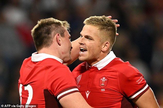 Gareth Anscombe (right) came on for Dan Biggar and scored 23 points for Wales, including a drop goal