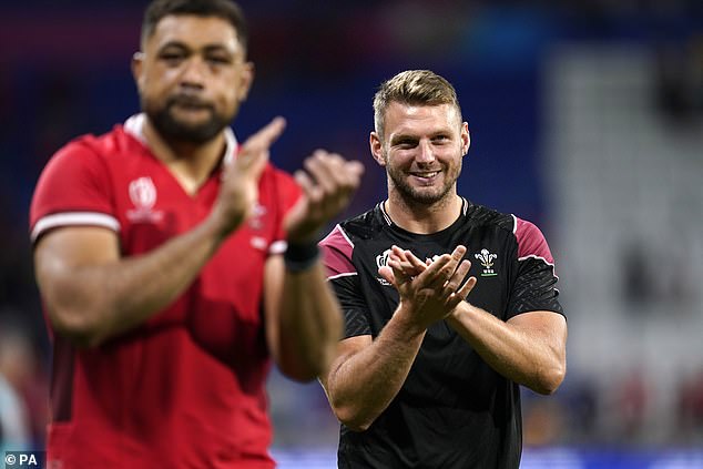 Biggar (right) left the field with a shoulder injury and could miss several weeks