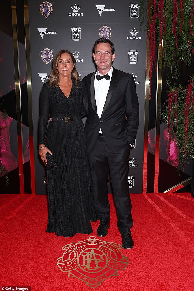 AFL CEO Andrew Dillon and his wife Amanda Dillon made a lovely pair with Andrew in a classic tuxedo and Amanda in a retro black maxi dress with sparkling elements