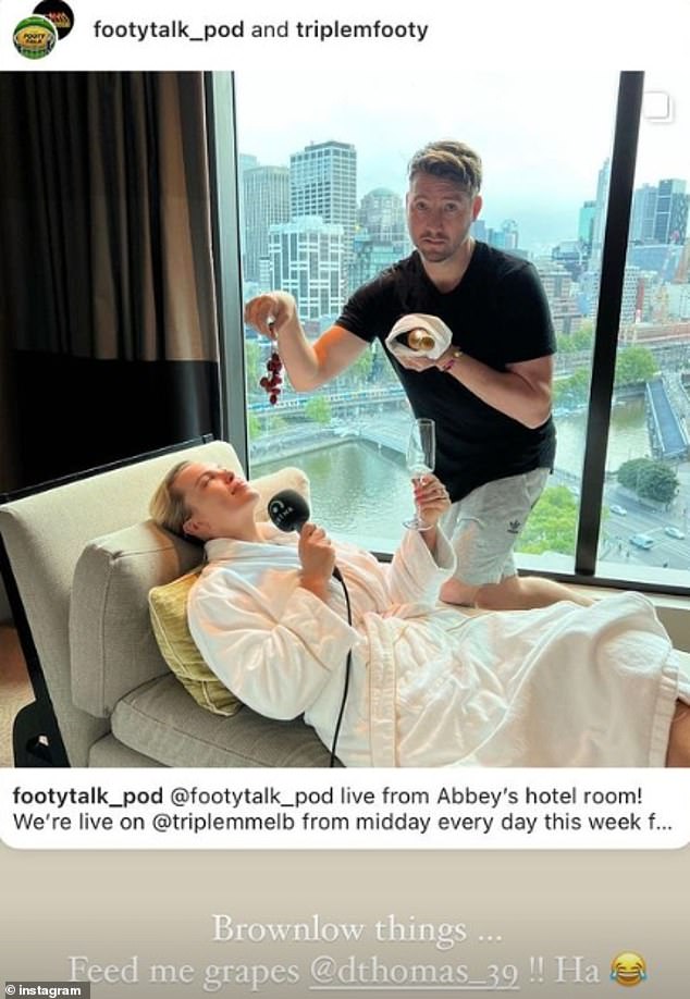 And AFLW star Abbey Holmes, 32, posted a photo of herself laughing with her footy star fiance Keegan Brooksby from a hotel suite in Melbourne