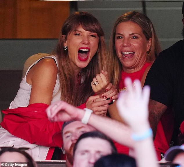 Happy days: Taylor and Kansas City Chiefs tight end Travis continued to fuel romance speculation after she attended his game on Sunday with his mother, Donna