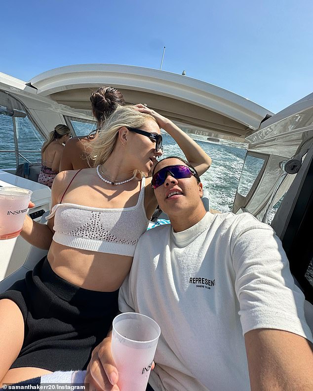 Another photo from Kerr's post on Monday evening showed the couple enjoying a ride on a boat - with the ring visible on Mewis' left hand