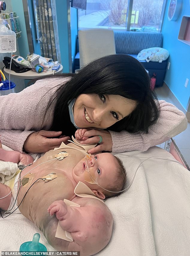 Baby Armani, pictured, spent the first three months of her life in Cincinnati, Ohio, in the hospital.  She is pictured above shortly after being born with her mother