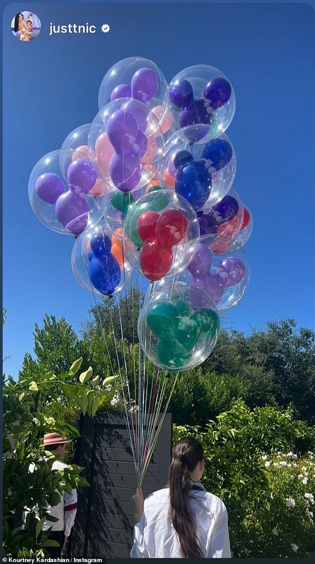 Festive: the iconic Disneyland sign was recreated with the words Baby Barker, the Dapper Dans sang, there were mouse ear hats, Mickey pancakes, Mickey balloons and a wish tree