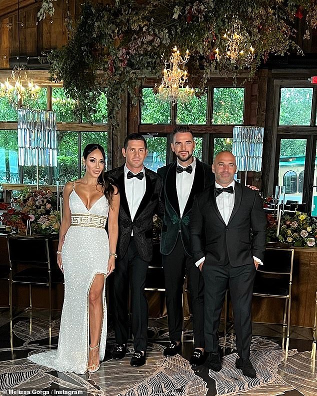 No with Husband: That's because the wedding was between two men: Gorga's cousin Nicholas Marco and his partner Mike Masco.  seen with husband Joe Gorga, far right