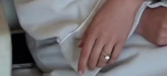 One photo showed a glamorous Abbey waving her hand at the camera to reveal her striking diamond engagement ring