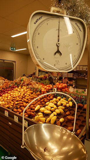 The store is one of the few that has not received a modern update and still features the old checkered floors, analogue vegetable scales, signage and cash register system