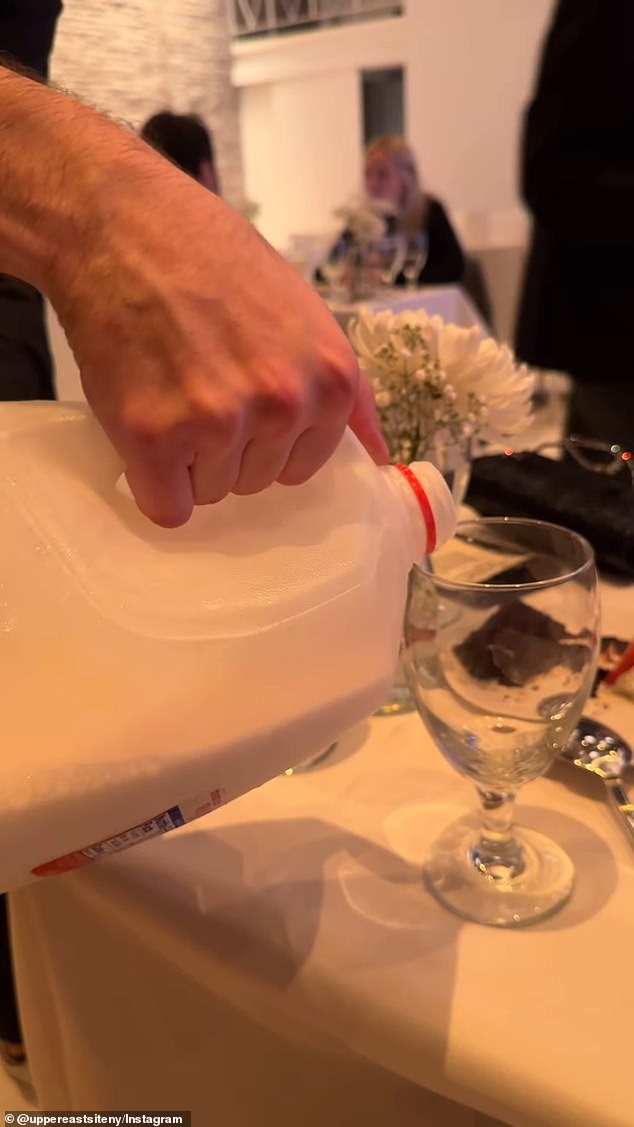 Instead of fine wine, servers poured glasses of milk for guests as part of the 'Bovine Circle of Life'