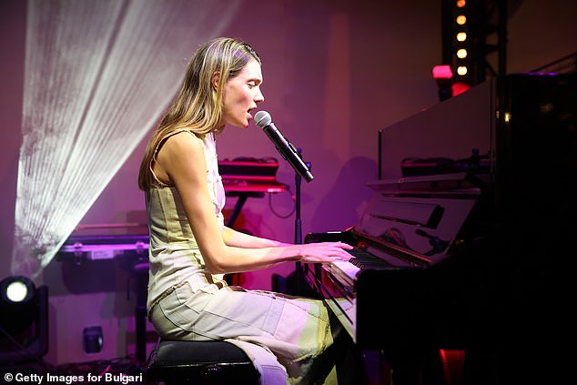 Performance: Singer Zita d'Hauteville took to the piano and performed for the guests during the glamorous event