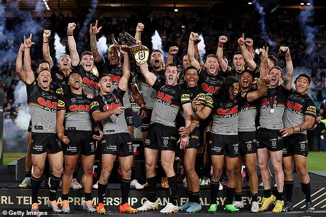 It's believed drinks breaks after 20 minutes of halves, extra trainers and later kick-off times for the build-ups of the Panthers-Broncos clash could beat the heat (pictured, Penrith stars celebrating last year's grand final win)