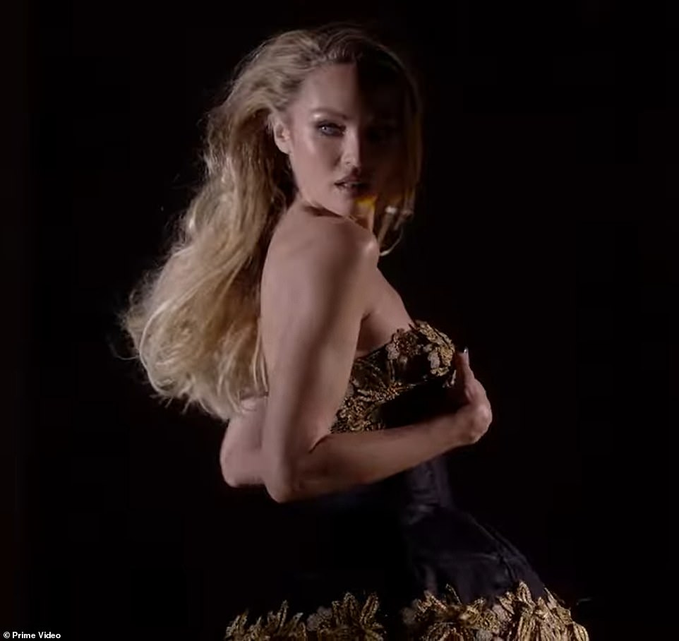 Radiant: Swanepoel, who became a Victoria's Secret Angel in 2010, put on a very leggy show in a black and gold lace mini dress