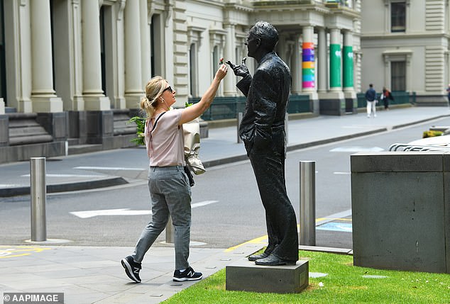 Andrews is the longest-serving Labor premier in Victoria's history, ahead of John Cain, who was elected in 2014 and served for almost nine years.  The statue of Cain is depicted