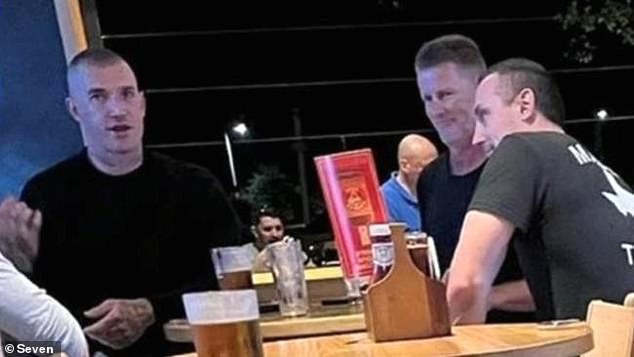 Martin was spotted enjoying a meal with former Richmond coach Damien Hardwick at a pub on the Gold Coast