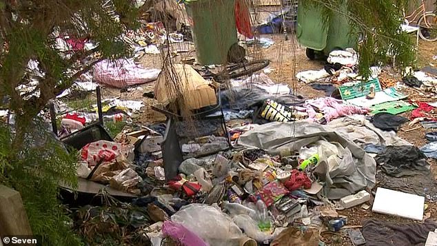 Piles of rubbish, including general waste and clothing, have been discarded all over the front garden of the house, with residents of nearby properties considering the house a major health hazard