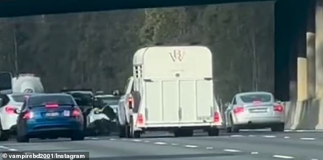 Terrifying dashcam footage posted on Sunday shows the car rear-ending the right lane before accelerating and swerving into the motorcycle, sending the rider careening across four lanes before crashing into a barrier.