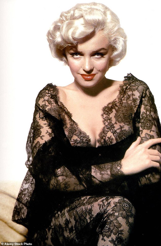 Words of wisdom: Joan revealed that she received advice from famed actress Marilyn in 1955, after Joan was cast as Evelyn Nesbitt in The Girl in the Red Velvet Swing